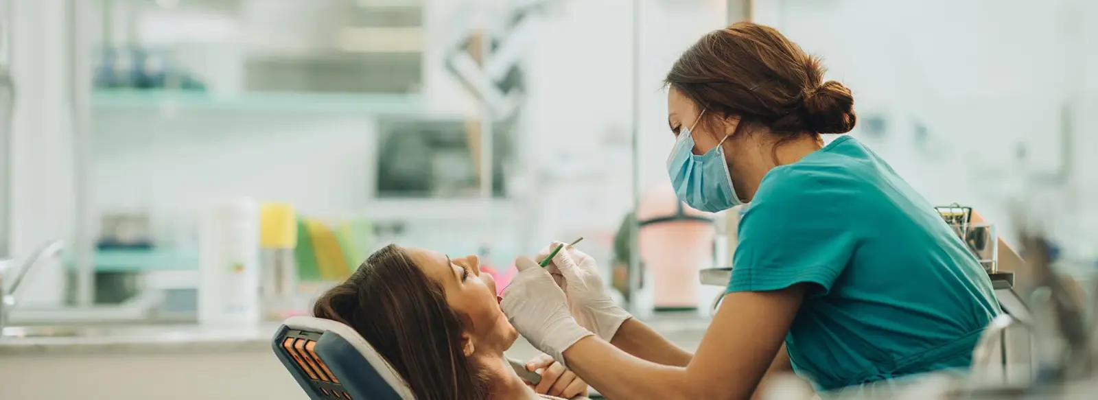Dentist treating a patient during a same-day emergency visit at Sierra Springs Dental